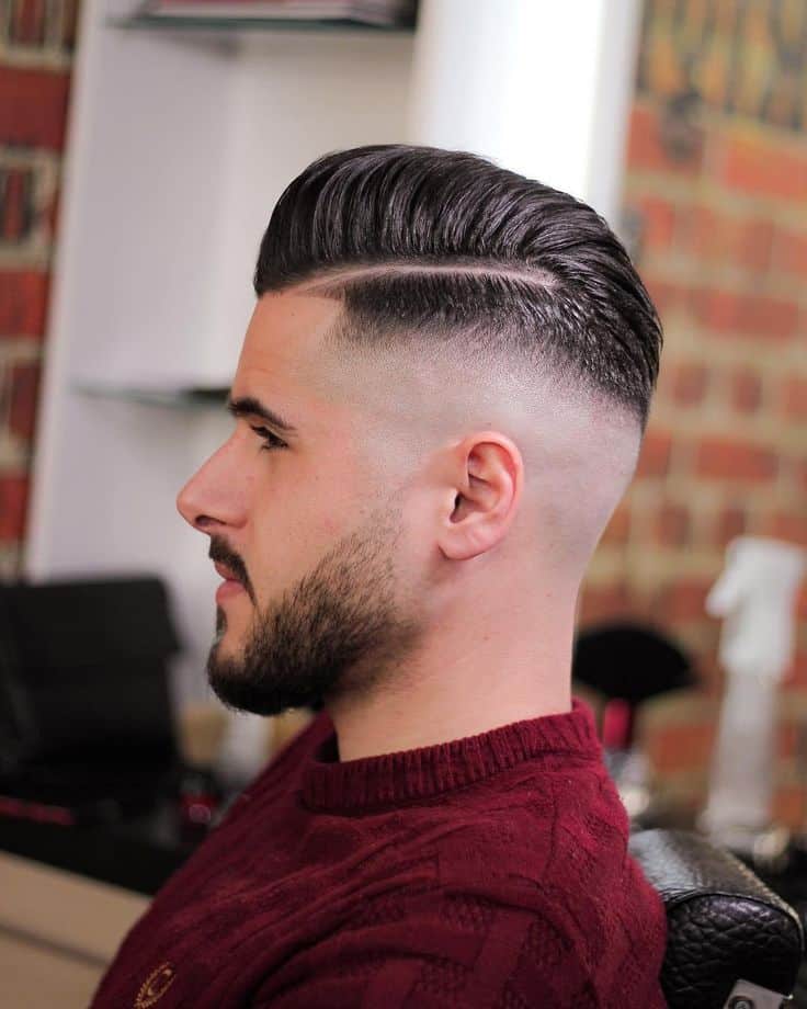 slicked-back hairstyle hard part men